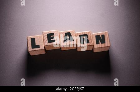 Learn Word Written on Wooden Cubes Stock Photo