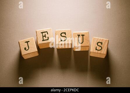 Jesus Word Written on Wooden Cubes Stock Photo