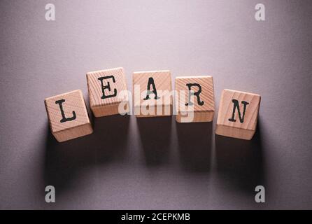 Learn Word Written on Wooden Cubes Stock Photo