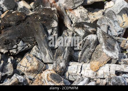 Close picture of live coals in dying out bonfire Stock Photo