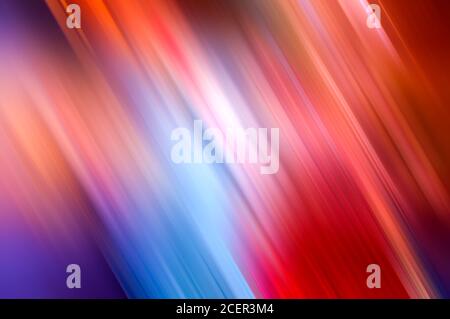 Diagonal stripes blurred gradient multi color vibrant slanted lines abstract background Stock Photo