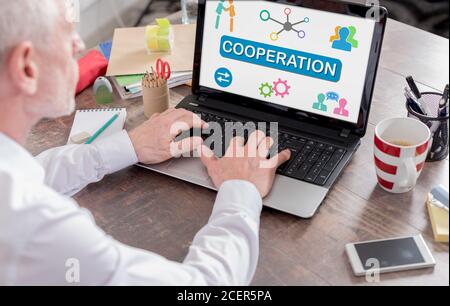 Cooperation concept shown on a laptop screen Stock Photo