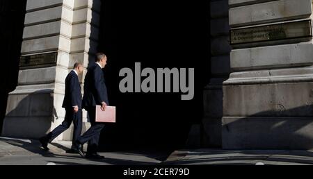 Foreign Secretary Dominic Raab (right) with the new Permanent Under Secretary Philip Barton arrive at the newly named Foreign, Commonwealth and Development office in King Charles Street, Westminster, London. Stock Photo