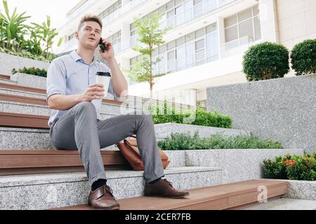 Young entrepreneur calling on phone Stock Photo