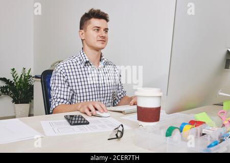 UI designer working on computer Stock Photo