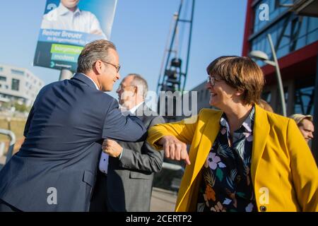 02 September 2020, North Rhine-Westphalia, Neuss: Saskia Esken, party leader of the SPD, and Reiner Breuer (SPD), Lord Mayor of Neuss, welcome each other at the summer trip of the SPD leadership before an election campaign event. Photo: Rolf Vennenbernd/dpa Stock Photo