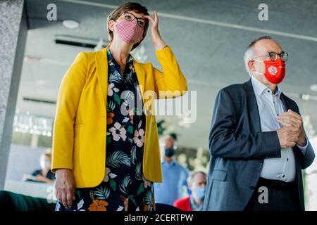 02 September 2020, North Rhine-Westphalia, Neuss: Saskia Esken and Norbert Walter-Borjans, party leader of the SPD, stand side by side during their summer trip when they visit an election campaign event of the mayor. Photo: Rolf Vennenbernd/dpa Stock Photo