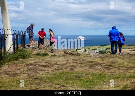 People at Top of North Berwick Law Stock Photo