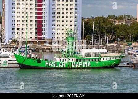 a green painted lightship at the entrance to haslar marina in gosport, portsmouth harbour, uk Stock Photo