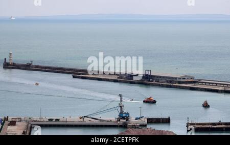 A group of people thought to be migrants are brought into Dover, Kent, by the RNLI following a small boat incident in the Channel. Stock Photo