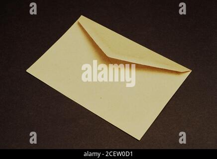 Examples of different sizes of yellow envelopes to send letters, paperwork, and so on. Envelopes used for mail. Stock Photo
