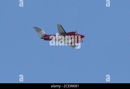 A HM Coastguard Beechcraft 200 Super King Air aircraft flies over Dover, Kent. Stock Photo