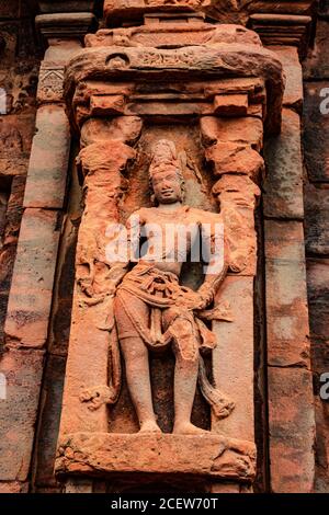 sculptures of hindu gods on facade of 7th century temple carved walls in Pattadakal karnataka. It's one of the UNESCO World Heritage Sites and complex Stock Photo