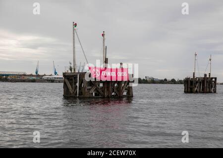 Cardiff, Wales, UK. 2nd Sep, 2020. An Extinction Rebellion banner on a structure in Cardiff Bay as part of a two-week programme of demonstrations in Cardiff, London and Manchester. It is attempting to focus on the climate across Wales and its impact on flooding, air pollution and our food security. Credit: Mark Hawkins/Alamy Live News Stock Photo