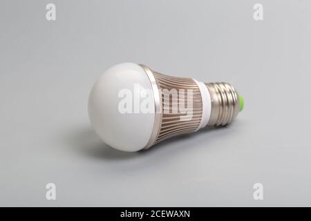 Glass bulb on gray background Stock Photo