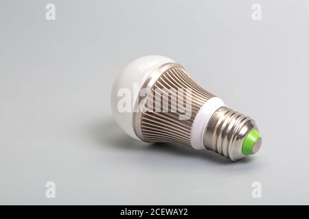 Glass bulb on gray background Stock Photo