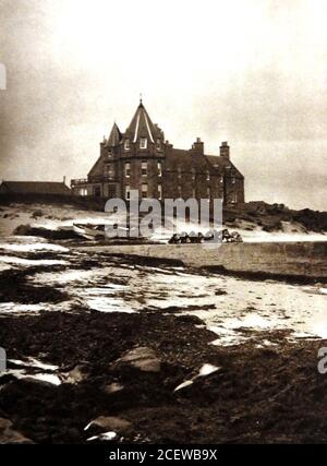 An old 1933 photograph of the  Seaview hotel at John O Groats, Scotland, (now the John o' Groats House Hotel / The Inn At John O’Groats) seen from the beach. John O'Groats  takes its name from  Jan de Groot, a 16th century Dutchman who once operated a ferry from the Scottish mainland to Orkney.In British culture, John O'Groats is linked with  Land's End (Cornwall) being at the extreme opposite end of the country. Bikers, walkers, motorists etc, often make the symbolic journey (either way) as a kind of non-religious pilgrimage, sometimes in order to raise cash for charity fundraising Stock Photo