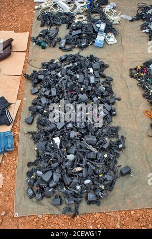 Zrenjanin, Serbia, November 10, 2015. A bunch of chargers for various mobile phones on the market where old and used goods and devices are sold. This Stock Photo