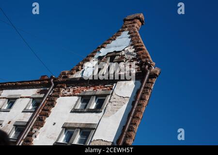 Flat vintage house top, extraordinary architecture, building close up, witch house in Vyborg Stock Photo