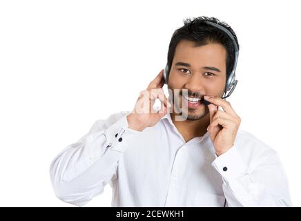 Closeup portrait of male customer service representative or call centre worker or operator or support staff speaking with head set, isolated on white Stock Photo