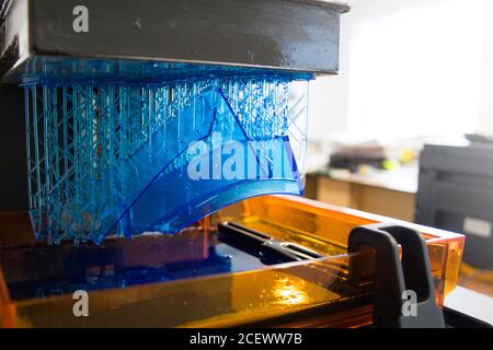 Working 3D printer. Electronic three dimensional printing machine in process. Automation technology. Automatic performing product detail creation. Clo Stock Photo