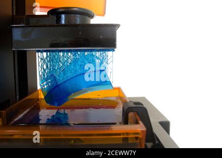 Working 3D printer. Electronic three dimensional printing machine in process. Automation technology. Automatic performing product detail creation. Clo Stock Photo