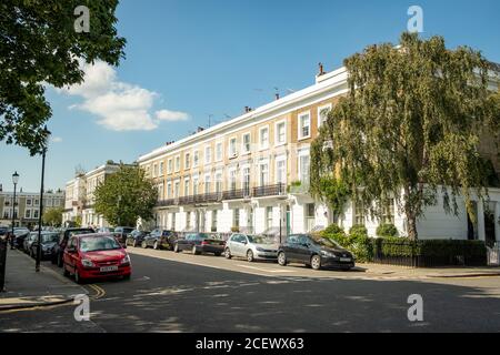 Typical street of beautiful white stucco terraced townhouses in Chelsea Stock Photo