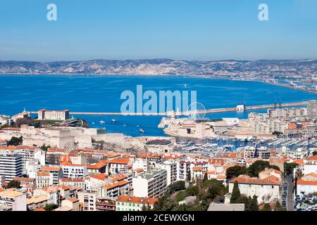 Aerial view of Vieux Port of Marseille with the Fort Saint-Jean, the Palais Pharo and the Fort Saint-Nicolas. Stock Photo