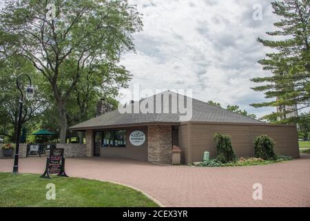 Naperville, Illinois, United States-April 24, 2014: Riverwalk Cafe building along the riverwalk path with signboard in Naperville, Illinois Stock Photo