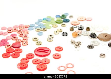 Flat lay with colorful sewing buttons, mock up, top view. Layout buttons mockup on blank white background for needlework, sewing, embroidery poster Stock Photo