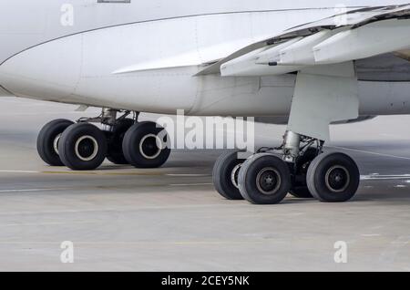 Landing gear of big passenger aircraft close up high detailed view Stock Photo