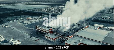 Aerial view of burning industrial building, fire with huge smoke from ...