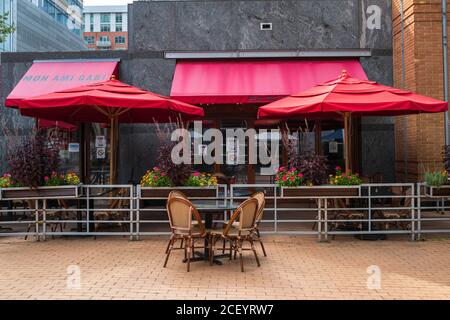 Reston, VA, USA -- September 2, 2020. A table and chairs in outdoor dining space at a French Bistro in tony Reston, Virginia. Stock Photo