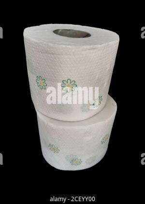 Two rolls of white toilet paper on a black background Stock Photo