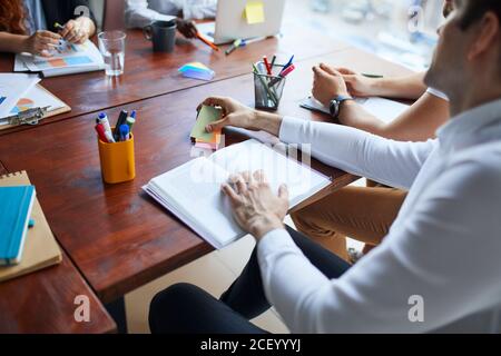 Team work process in modern office using papers. Analyze plans for future business strategy Stock Photo