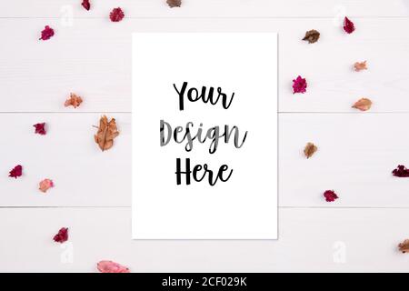 Blank paper sheet copy space with mockup and flower dry on white background, poster and invitation, postcard decoration your design or branding, simpl Stock Photo