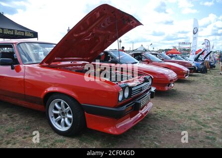 A line of classic cars parked up on display at the English Riviera classic car show, Paignton, Devon, England, UK. Stock Photo