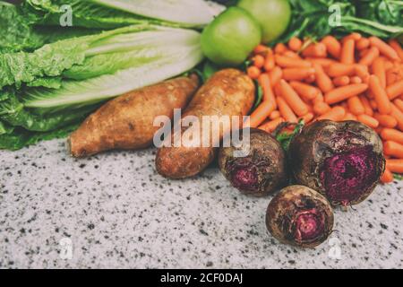 Autumn vegetables beets sweet potatoes background Stock Photo