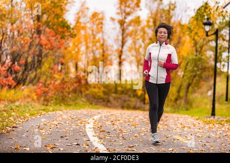 Mature Asian woman running living healthy lifestyle Stock Photo