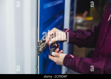 View of self storage warehouse, process of keeping and storing the goods and items in storage units, self-storage building, lock and key concept Stock Photo