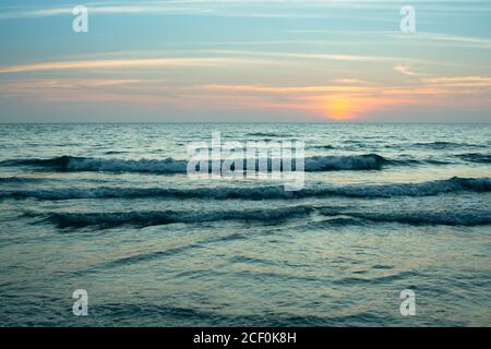 Seascape in cool tones after beautiful sunset. Stock Photo