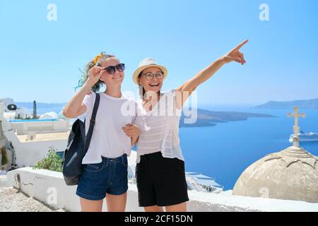 Mother and teenage daughter traveling together, luxury travel, island Santorini Stock Photo