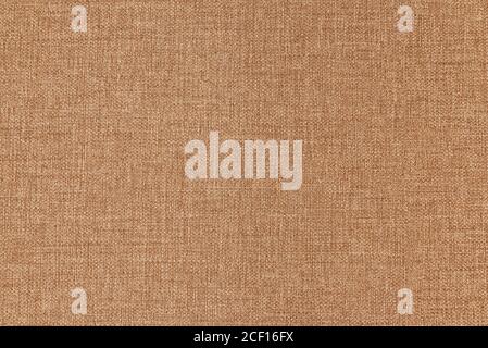 Texture canvas fabric as background light brown. Small texture. Rough linen material Stock Photo