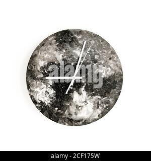 Round black watercolor clock isolated on white background. Minimal concept. Flat lay. Top view. Stock Photo