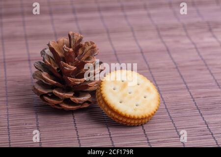 Cream sandwich biscuits on bamboo curtain background Stock Photo