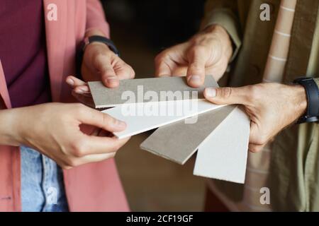 Close-up of people choosing color for their design project Stock Photo