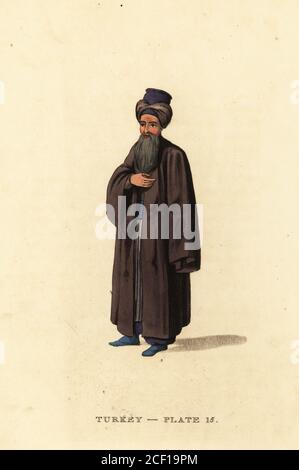 Costume of a Jewish man in Constantinople. He wears a dark turban, long beard and robes.  Handcoloured copperplate engraving after Octavian Dalvimart from William Alexander’s translation of Picturesque Representations of the Dress and Manners of the Turks, Thomas M’Lean, London, 1814. Stock Photo
