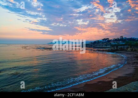 Tropical beach sunset in beautiful blue and pink colors Stock Photo