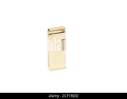 Golden lighter on white background Stock Photo