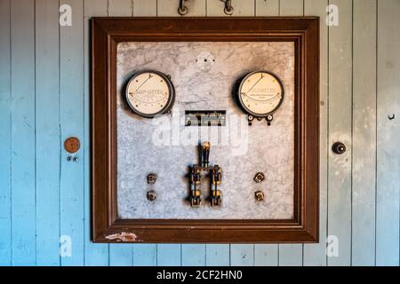 Old electrical instruments on a marble panel Stock Photo